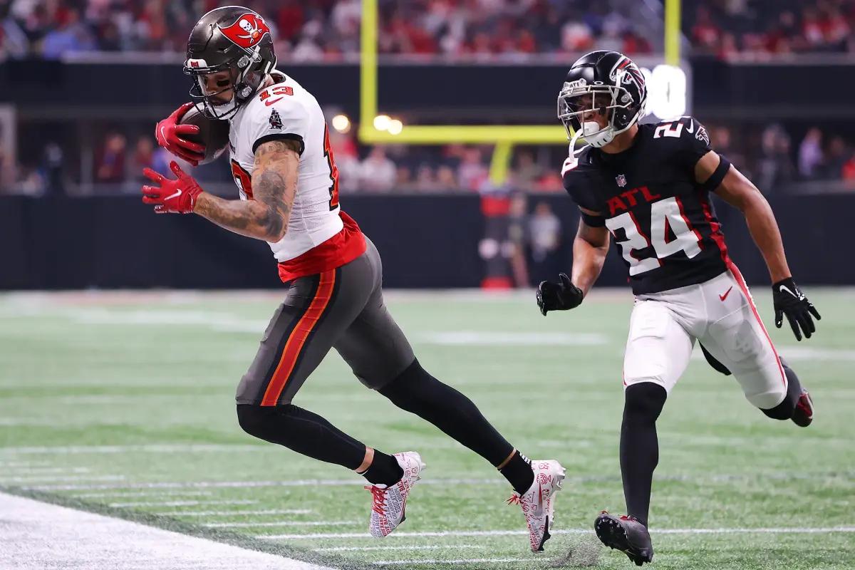 Mike Evans (13) being defended by A.J. Terrell (24). 